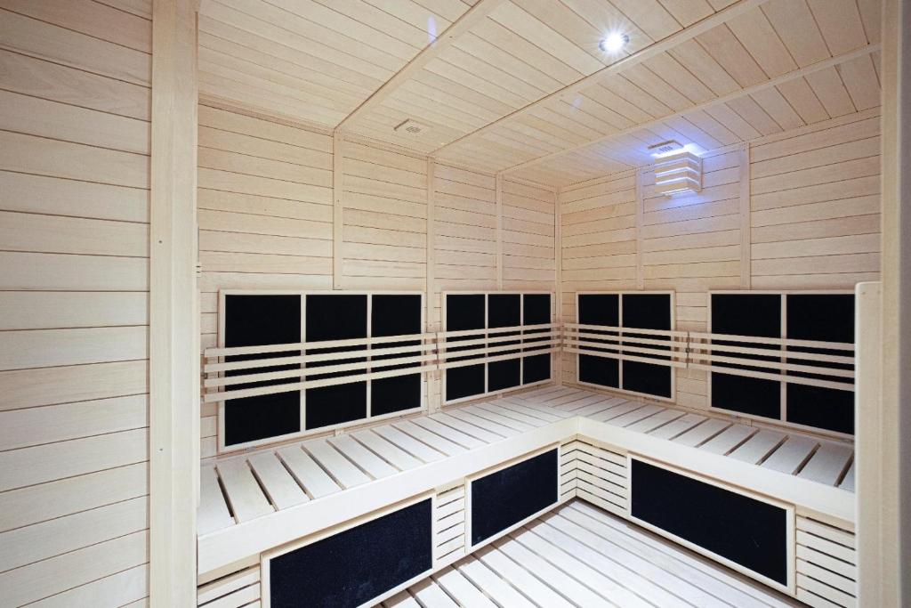Infrared sauna with wood panelling