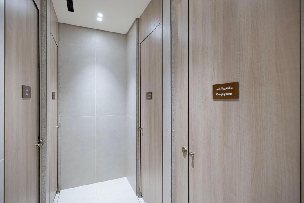 Wood-panelled changing rooms serving the leisure facilities